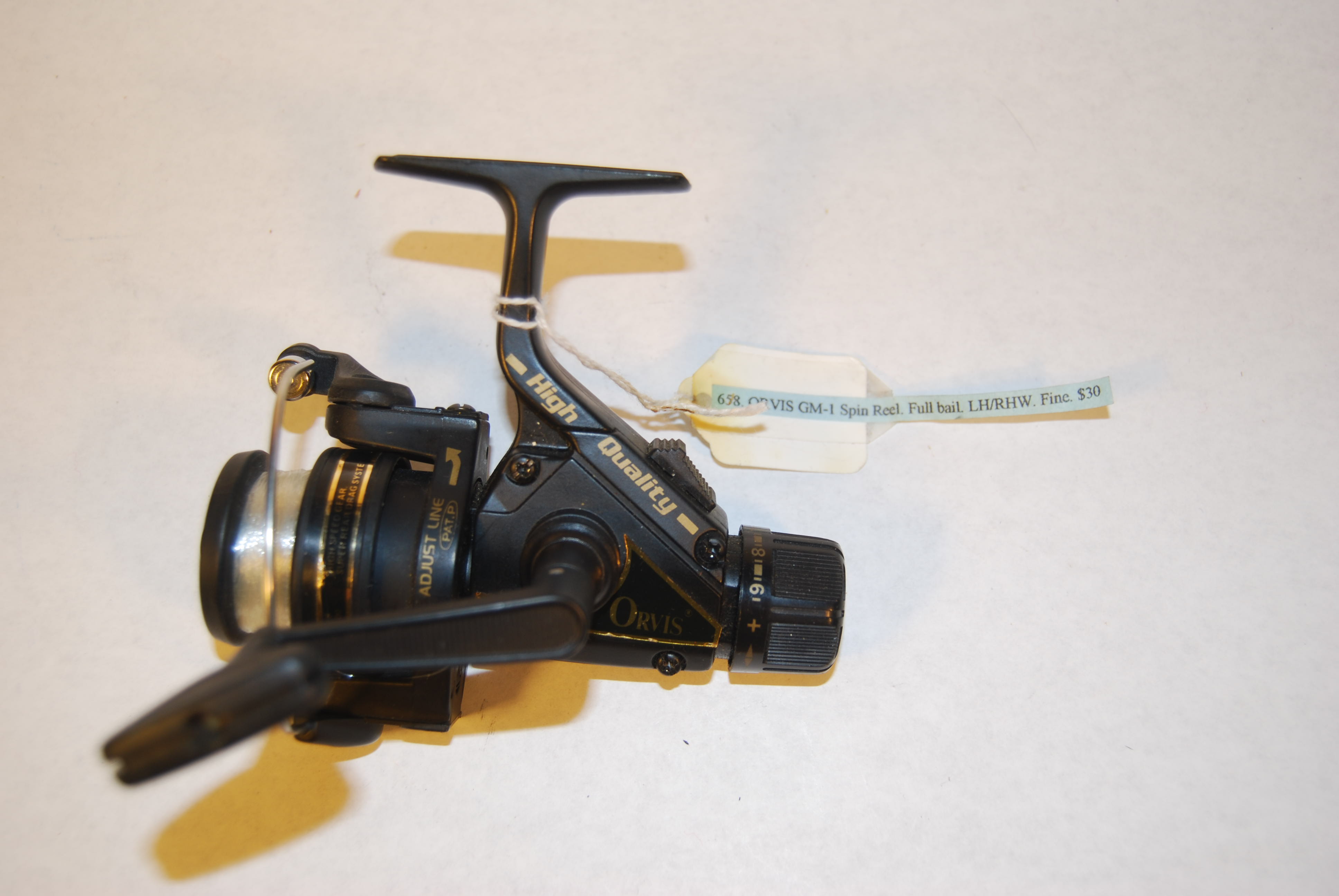 ORVIS “GM1” Spin Reel. Cap. 240 yd. 4 mono. Rear drag adjustment; RH/LH.